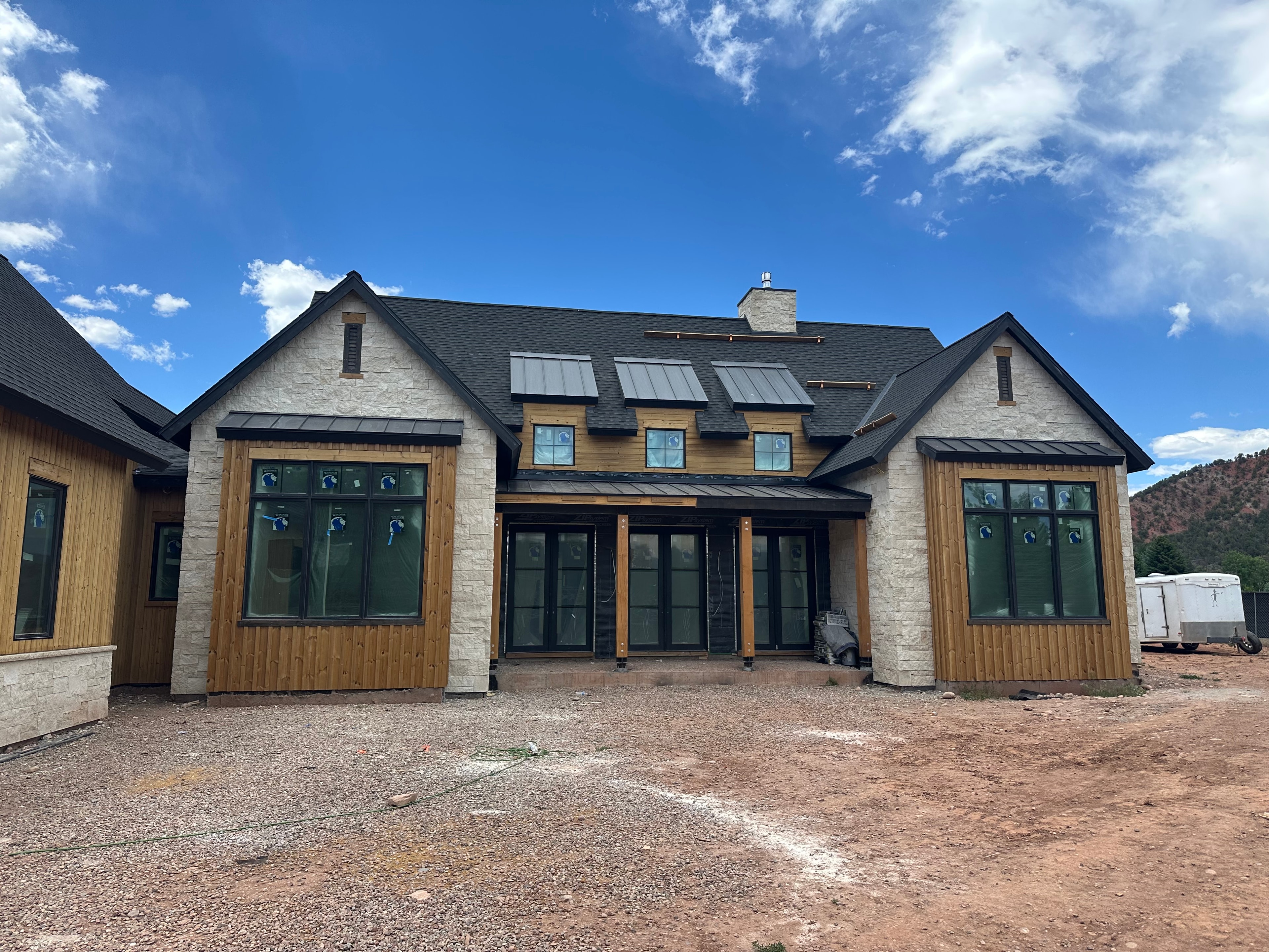 Big Bear Tile and Stone project — home with stone veneer exterior
